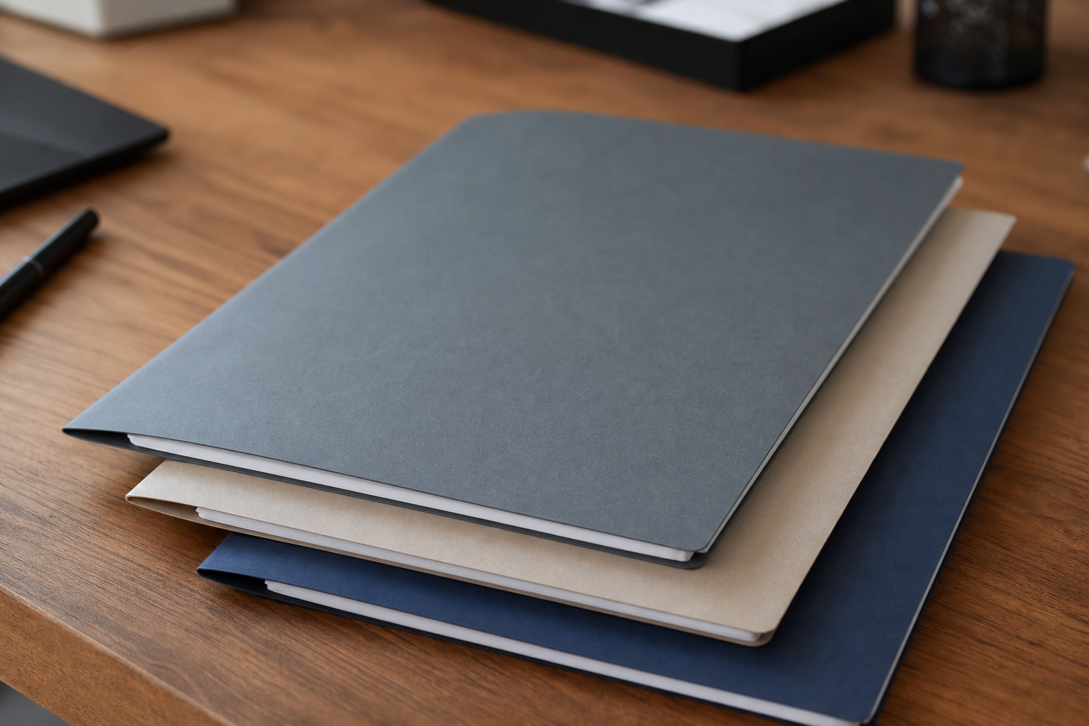 Financial disclosure document folders on a desk